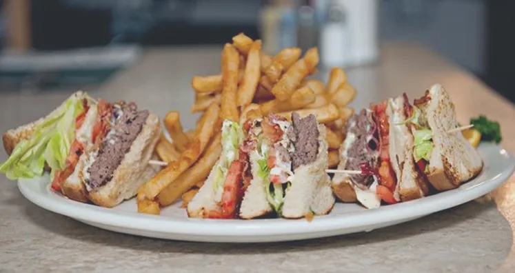 Club sandwich with French fries